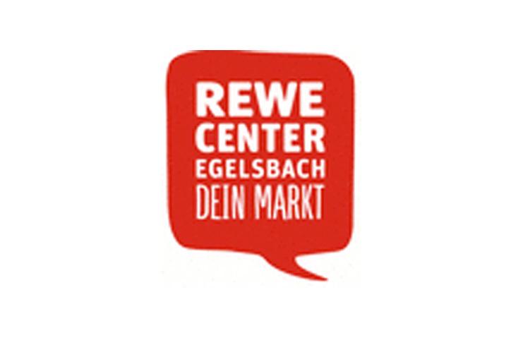 Logo des REWE Centers Egelsbach mit dem Slogan &bdquo;Dein Markt&ldquo; in einem roten Sprechblasen-Design.